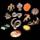 A group of Vintage and other brooches, including a silver-mounted agate brooch, peacock, Art Deco