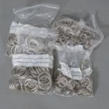 A quantity of stainless steel rings. From the workshop of saddle maker Brian R. Borrer (Artistry