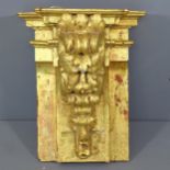 An ornate carved giltwood wall bracket, probably early 20th century, height 46cm, width 38cm A few