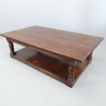 An antique oak two-tier plank top low coffee table. 153x46x86cm.