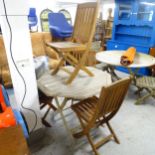 A weathered teak octagonal folding garden table, and four stained teak folding chairs. 101x74cm.