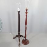 A mahogany standard lamp with turned column and another mahogany standard lamp (2). Tallest - 137cm.