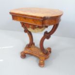 A Regency burr walnut sewing table. 63x74x46cm