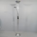 A modern chromed combination lamp, with uplighter and adjustable reading lamp. H - 184cm.