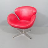 A mid-century style swivel lounge chair in the manner of the Arne Jacobsen Swan chair, upholstered