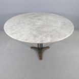 A marble circular garden table on painted metal base. 120x74cm.