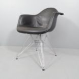 VITRA - a Charles Eames DAR upholstered shell armchair on chrome Eiffel base, with Vitra moulded