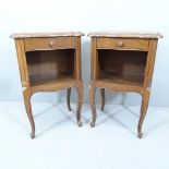 A pair of French oak bedside tables. 44x70x32cm.