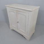 A Victorian painted pine two door cabinet. 84x89x37cm