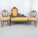 A walnut and upholstered chaise long, with carved and ebonised decoration, 135x126x65cm,