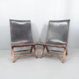 A pair of black studded leather upholstered slipper chairs with oak frame, in the manner of Pierre