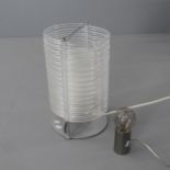 A vintage spring table lamp, with acrylic outer and glass inner shades on steel base, height 43cm,