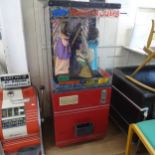 A vintage Punch and Judy arcade machine with automaton characters. 57x142x54cm.