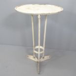 A vintage painted metal circular-topped side table. 54x81cm.