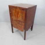 A Georgian mahogany and satinwood strung Gentleman's wash stand, with fold out top, blue and white