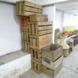 Twelve various vintage wooden fruit and drinks crates, lables include David Greig ltd. and John