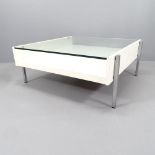A mid-century Danish design coffee table, the later painted wood frame on steel legs with inset