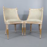 A pair of oak and upholstered French salon chairs with carved swan decoration.