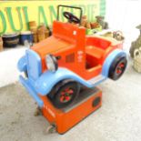 A child's coin operated ride-on car. Overall 105x110x58cm. Operates with 50ps and in working