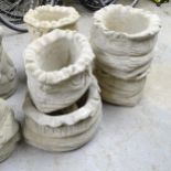 Three pairs of modern concrete sack design planters. largest 44x26x40cm.