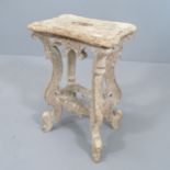 A continental limed oak stool. 38x58x28cm.
