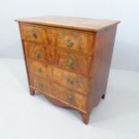 A 19th century flame mahogany veneered chest of four drawers. 70x76x44cm. Some veneer missing,