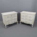 A pair of French painted chests of three long drawers, with carved decoration and cabriole legs.