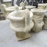 A pair of modern concrete two-section garden urns, 50x53x36cm, and pair of concrete planter/umbrella