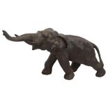 Japanese Meiji Period patinated bronze bull elephant, late 19th century, unsigned, length 32cm