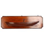 A 19th century mahogany ship builder's half-hull wall plaque, 78 x 24cm A small chip on the