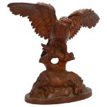 19th century Black Forest sculpture, depicting an eagle with dead ibex, height 26cm Several
