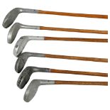 A group of 6 Vintage wood-shafted aluminium golf clubs