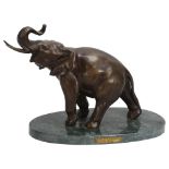 A patinated bronze elephant sculpture, on green marble base, base length 27cm