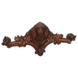 19th century Black Forest carved wood wall-hanging coat rack, with dog's head mount, width 40cm