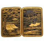 O Komai, Japanese inlaid metal 2-section belt buckle depicting Mount Fuji, dragonfly seal mark,