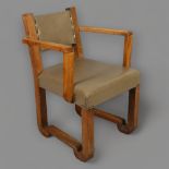Francisque Chaleyssin, a French Art Deco oak armchair with leather upholstery, height 76cm