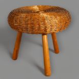 A Tony Paul 1960s' wickers stool / ottoman on beech tripod frame, height 43cm, diameter 45cm Good