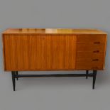 A 1950/60s' Danish style credenza / sideboard, probably retailed by Heals, with routed door detail