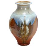 A studio pottery vase of panelled baluster form with dripping glazes, impressed makers marks, height