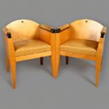 A pair of post-modern armchairs in maple and leather in the manner of Michael Graves, height 77cm