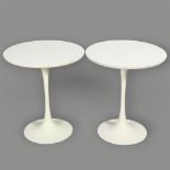 Maurice Burke for Arkana, a pair of 1960s' round side tables', with white laminate top and enamelled