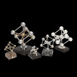 5 metal models of the Brussels Atomium, various metals on marble and metal bases, tallest 19cm All