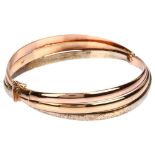 An Italian 9ct three-colour gold hinged bangle, setting height 14.9mm, internal circumference