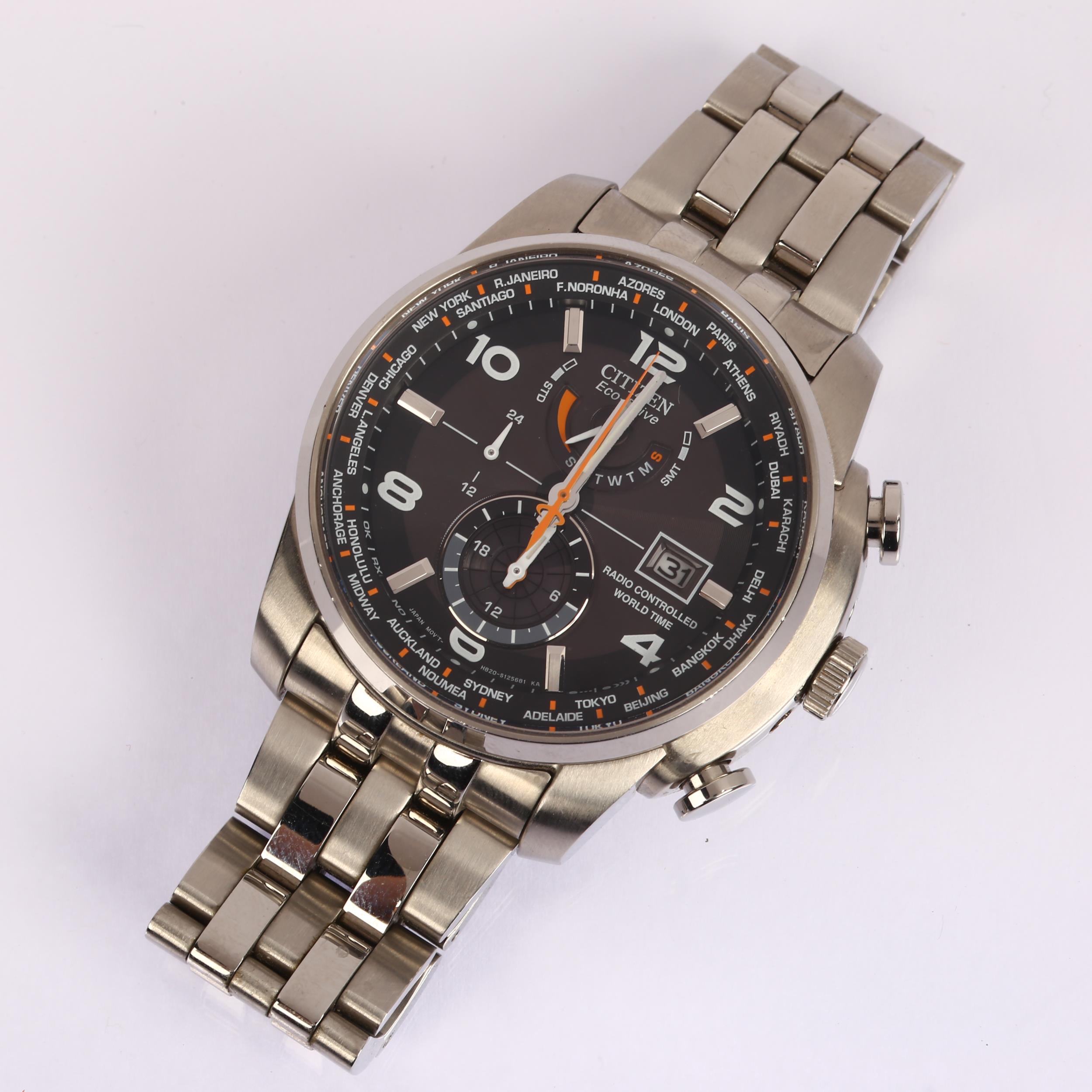 CITIZEN - a stainless steel Eco-Drive Radio Controlled World Time Solar quartz bracelet watch, - Bild 2 aus 5