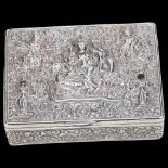 A heavy Indian silver stone set trinket box, relief embossed decoration depicting Murugan riding