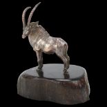 An African miniature silver model antelope, Patrick Mavros, undated, on hardwood stand, base width