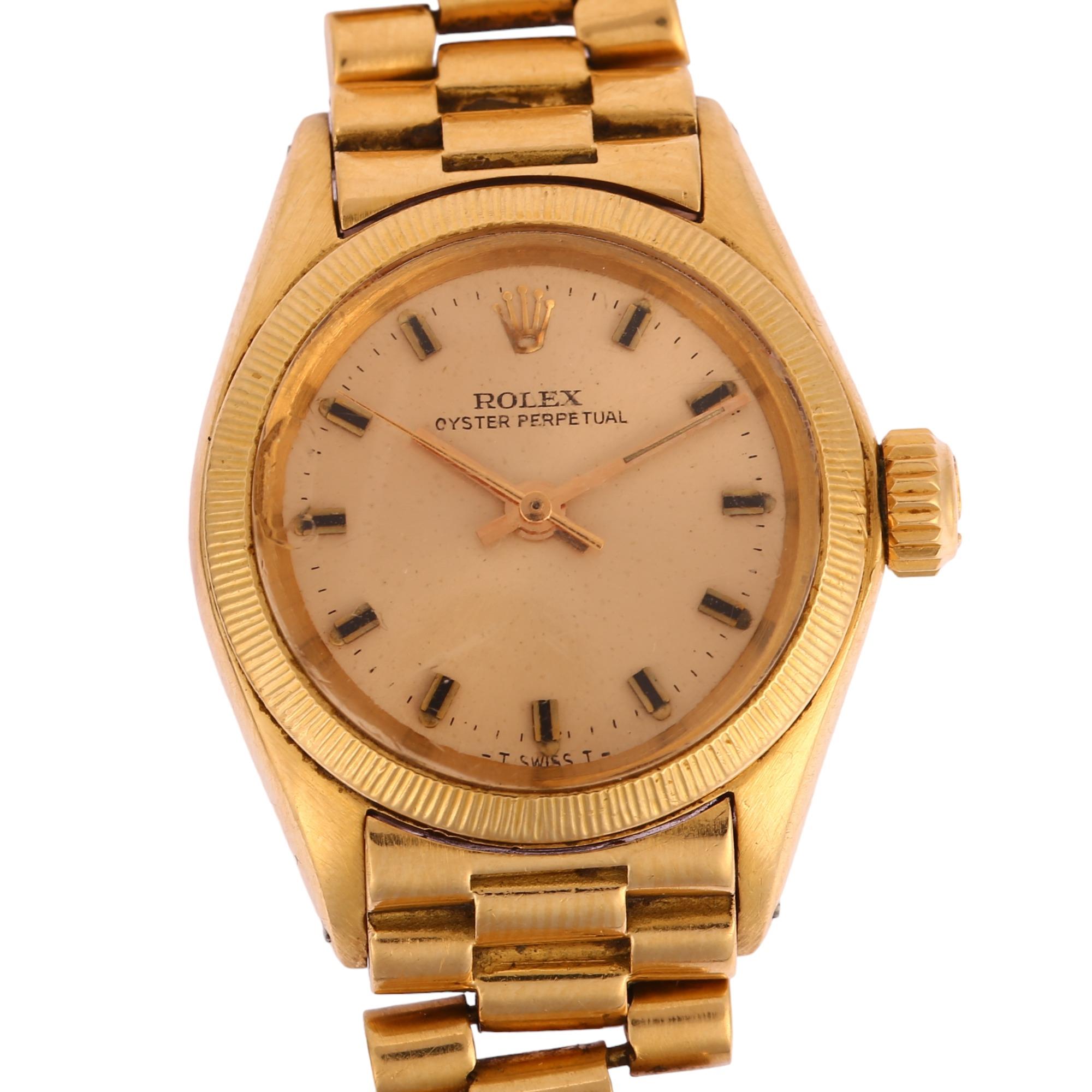 ROLEX - a lady's 18ct gold Oyster Perpetual automatic bracelet watch, ref. 6617, champagne dial with