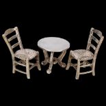 A German 800 silver miniature doll's dining set, comprising tripod table and pair of rush-seated