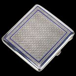 A German 800 silver and blue enamel cigarette case, square form with engine turned decoration and