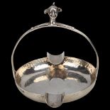 An Arts and Crafts George V silver 'Jester' ashtray, Elkington & Co Ltd, Birmingham 1910,